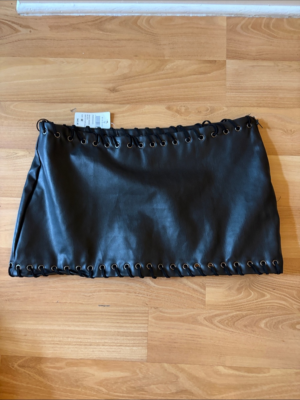 Black Faux Leather Eyelet Mini Skirt